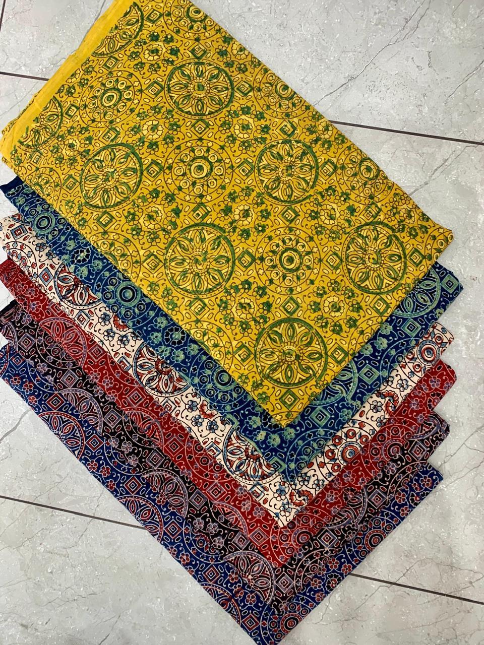 Multi-pattern Ajrakh printed pure cotton wholesale fabric featuring classic handcrafted Rajasthan designs by Fabtexs.